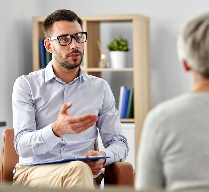 Psychologist talking with a client